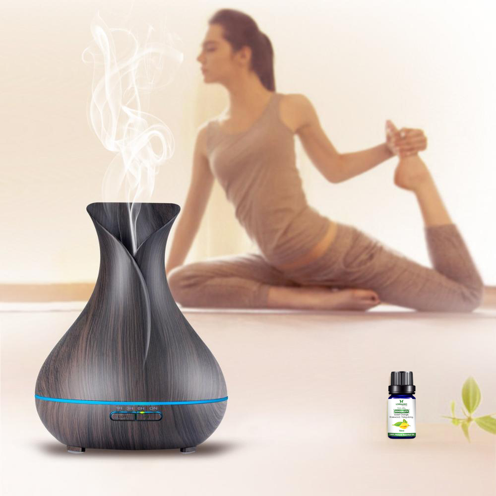 Combo máy khuếch tán/ máy xông tinh dầu bình hoa + tinh dầu sả chanh + tinh dầu cam Lorganic