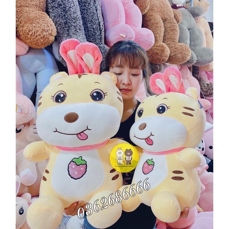 Gấu bông- gấu hổ đeo tai thỏ lè lưỡi cute - Gấu Bông Hana