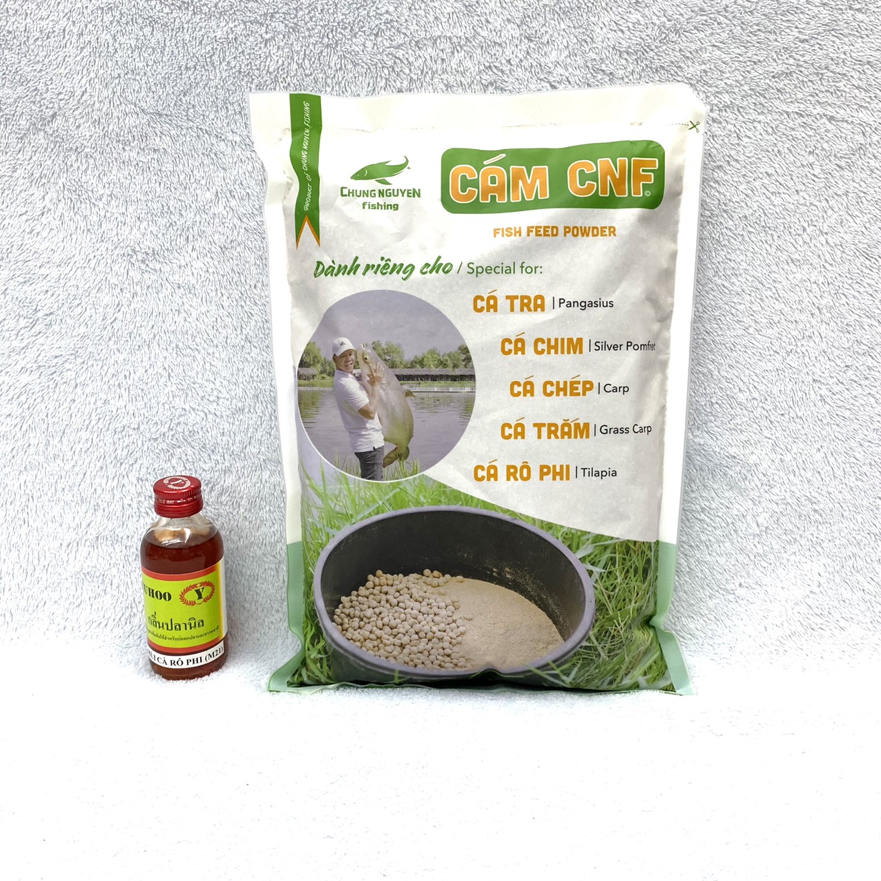 Mồi Câu Cá Rô Phi , Combo 1kg Cám CNF + 1 Chai Tinh Mùi Thái Lan M21 Chuyên Câu Cá Rô Phi