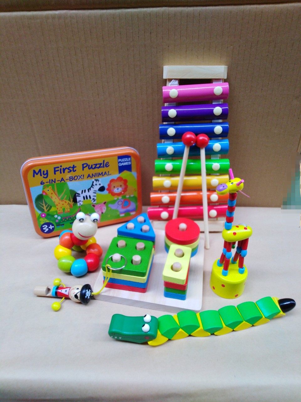 Combo 4 món phát triển trí tuệ cho bé (đồng hồ gỗ, đàn gỗ, còi gỗ, trụ gỗ thả hình học)