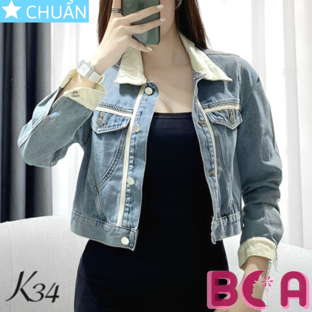 Áo khoác Jeans nữ lửng K34 phối màu xanh và kem tạo sự thanh lịch, nhã nhặn nhưng không kém phần cá tính và năng động