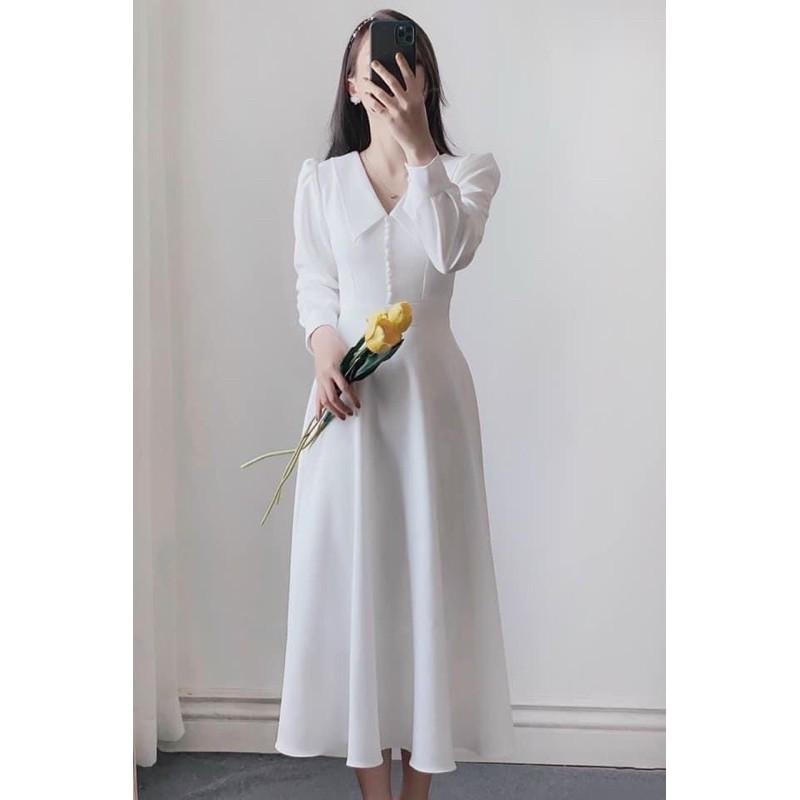 Đầm trắng tay dài nút bọc