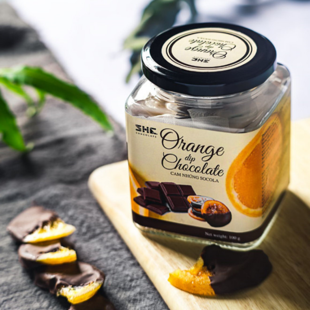 Cam nhúng socola - Hũ thủy tinh100g - SHE Chocolate - Bổ sung năng lượng, đa dạng vị giác. Quà tặng sức khỏe, quà tặng người thân, dịp lễ, thích hợp ăn vặt