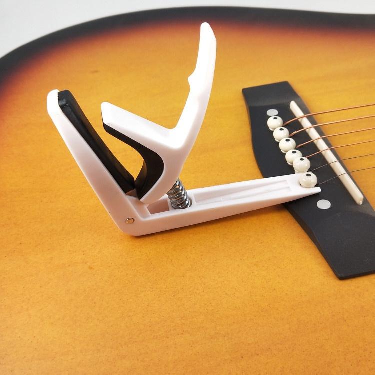 Capo Guitar Acoustic giá rẻ có tích hợp nhổ chốt giữ dây