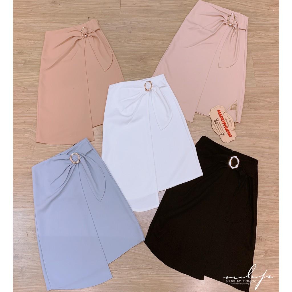 Chân váy midi vạt chéo nơ lệch khoen tròn