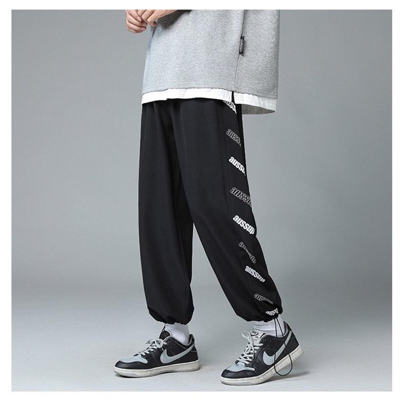 Quần jogger unisex ́ ̉ ̣̂ Quần ống rộng có dây rút ở gấu chất Umi thể thao, chất lì không xù