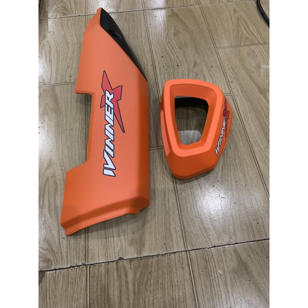 Ốp pô và chụp đích pô xe winner x màu cam