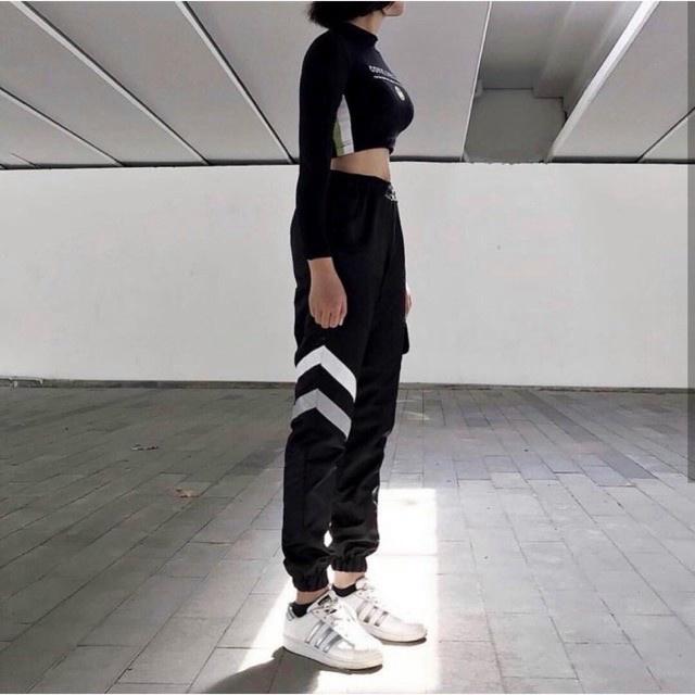 QUẦN JOGGER NỮ CHẤT DÙ CÓ PHÁT SÁNG CHẠY DỌC PHONG CÁCH CHO CÁC QUÝ CÔ HOT BAO ĐẸP CỦA KMG TP0111 HÌNH THẬT