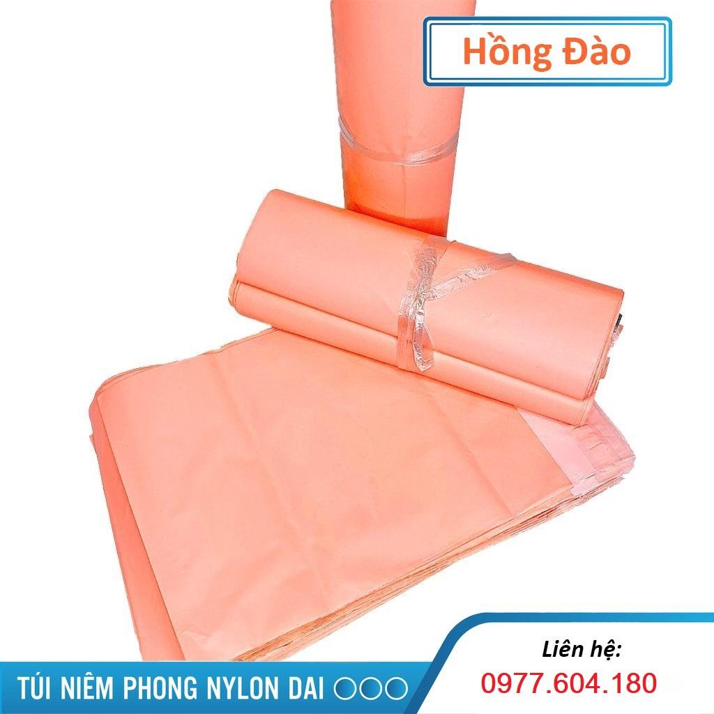 Túi gói hàng túi đóng hàng size 32x45cm cuộn 100 túi màu hồng đào loại bóng dẻo