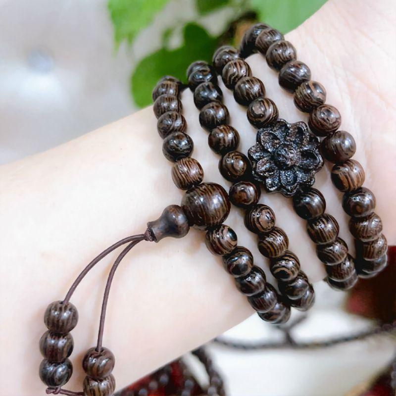 Vòng tay nữ 6 ly chuỗi tràng hạt 108 gỗ vân mun đuôi công mix charm hoa sen