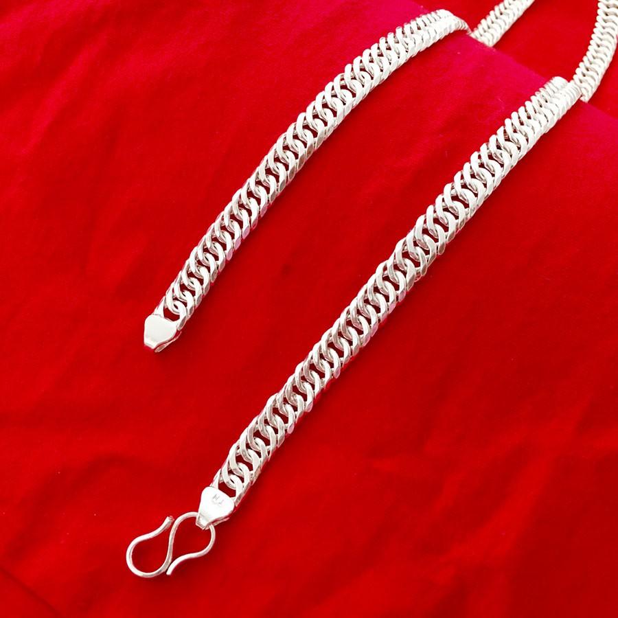 Dây chuyền bạc nam Bạc Quang Thản thiết kế kiểu dây bản dẹt độ dài 50cm, trọng lượng có nhiều lựa chọn chất liệu bạc ta.