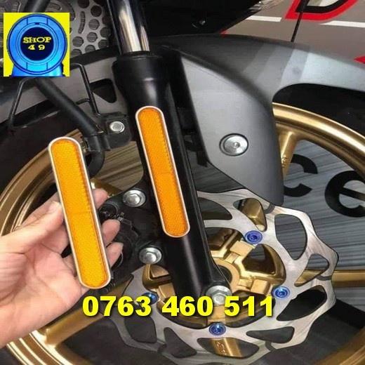 Mắt mèo dạ quang dài gắn phuộc trước