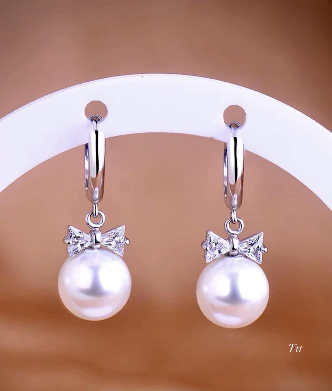 Bông tai bạc khuyên tròn nơ trai chất liệu bạc s925 MS065d