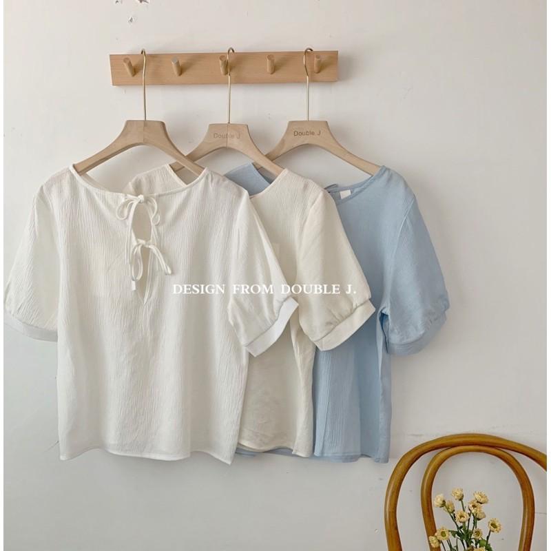 Sơ mi thắt nơ sau lưng chất trượt nhẹ