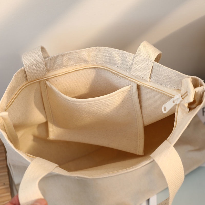 Túi Tote Nữ Thời Trang Hàn Quốc Vải Bố Canvas Màu Kem Dạng Đeo Vai Có Khóa Kéo Ngăn Phụ Trong Đựng Macbook, Laptop. Phụ Kiện Đi Làm Văn Phòng Đi Học Chơi Du Lịch Dã Ngoại Phượt