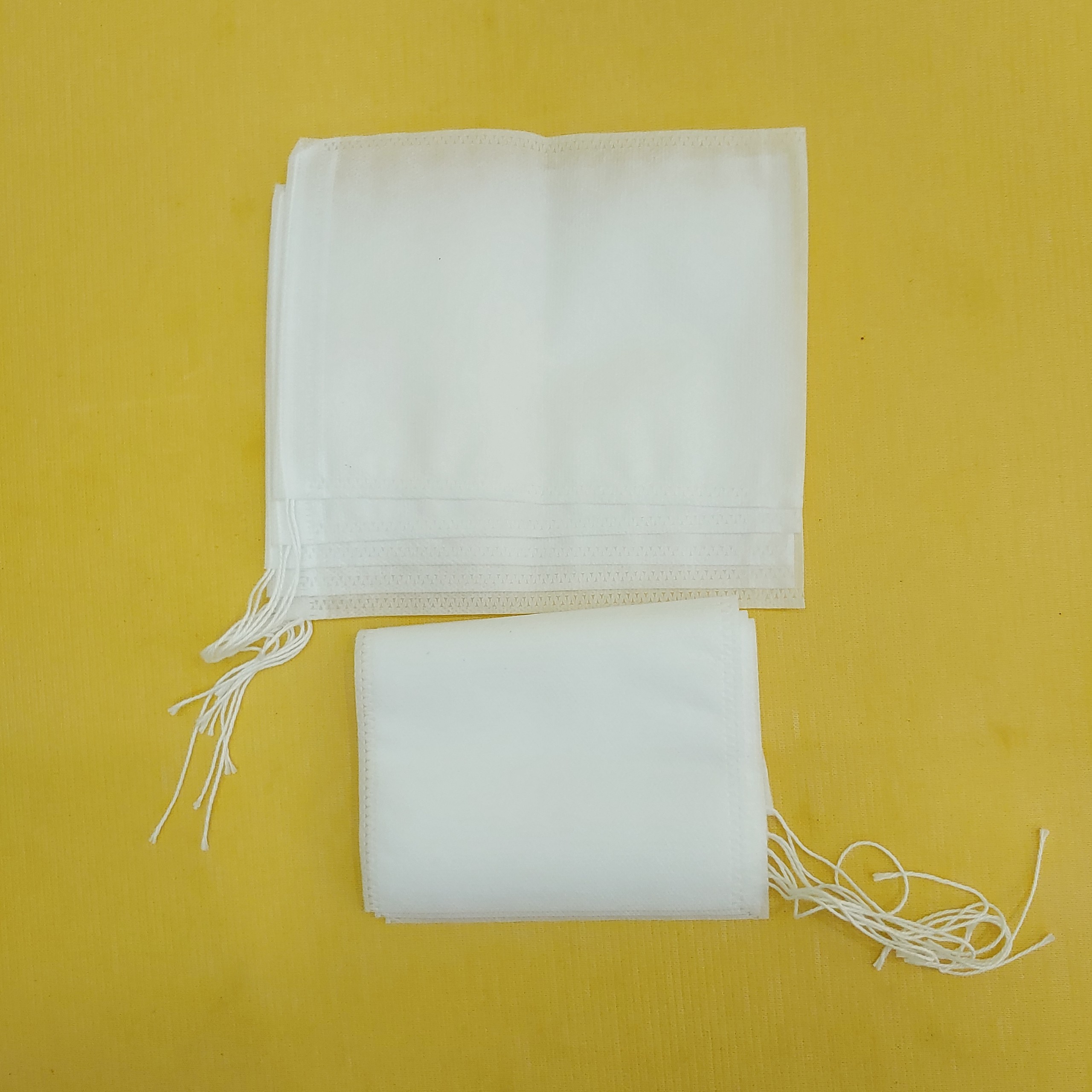 100 túi lọc trà / túi vải không dệt cao cấp có dây rút size 13 x18
