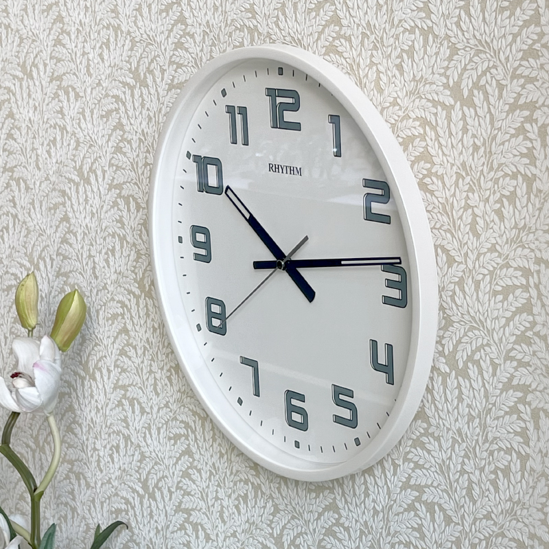 Đồng hồ treo tường Nhật Bản Rhythm CMG599NR03- Kt 30.6 x4.0cm, 630g Vỏ nhựa. Dùng Pin.