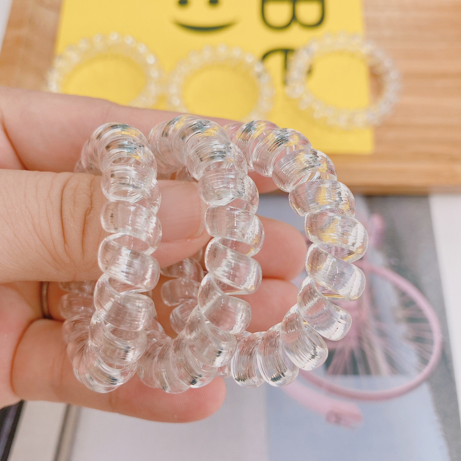 Dây buộc tóc nhựa dạng lò xo xoắn trong suốt gọn gàng dành cho nữ