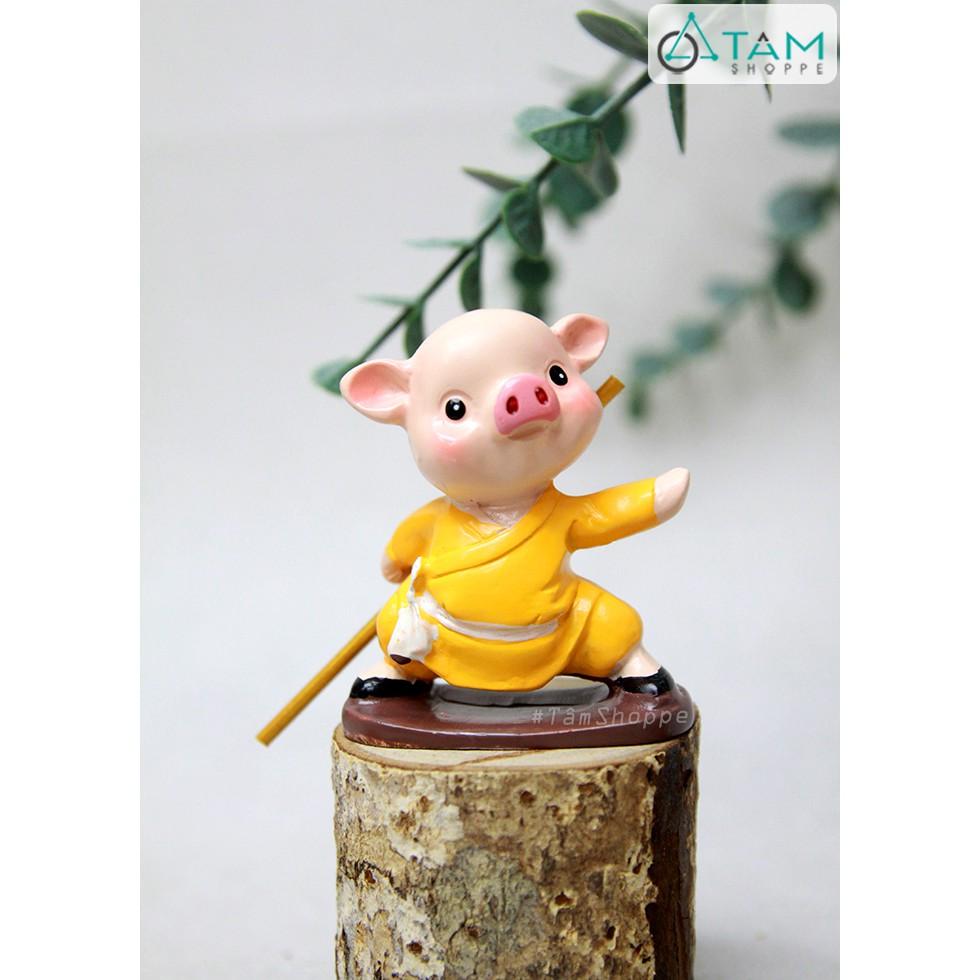 Bộ 04 tượng chú heo múa gậy