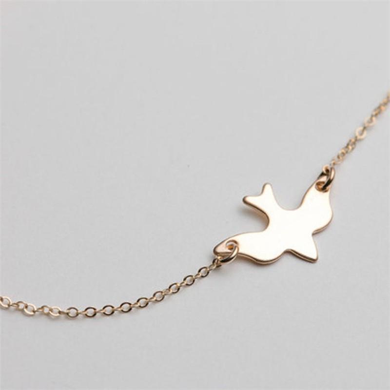 Dây chuyền kim loại mạ vàng mặt chim bồ câu