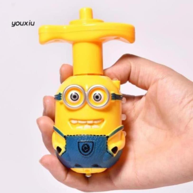 Con Quay Hình Minion Có Đèn Led Và Nhạc Cho Bé