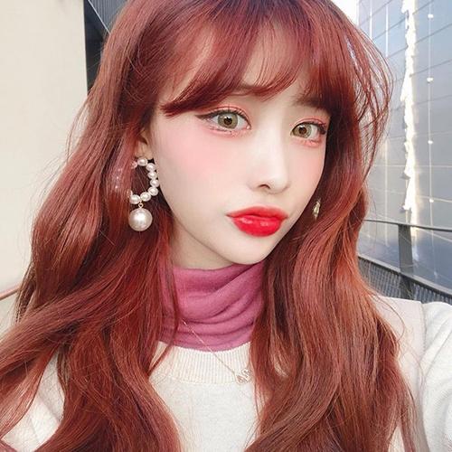 Nhuộm tóc màu đỏ ánh cam kèm oxi và gang tay