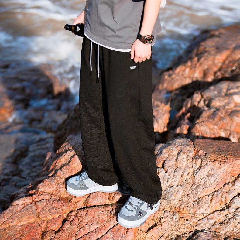 Quần jogger nam nữ ống rộng thể thao nỉ sợi polysster cao cấp phong cách đường phố J2077 - Đen