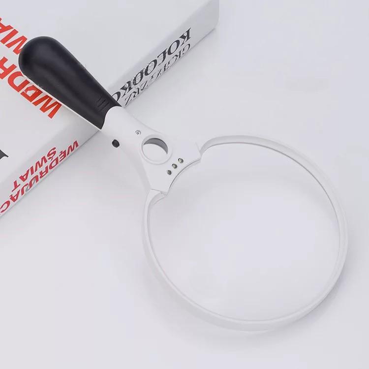 Kính lúp cầm tay có đèn 137mm 607b phóng đại 2X, 25X
