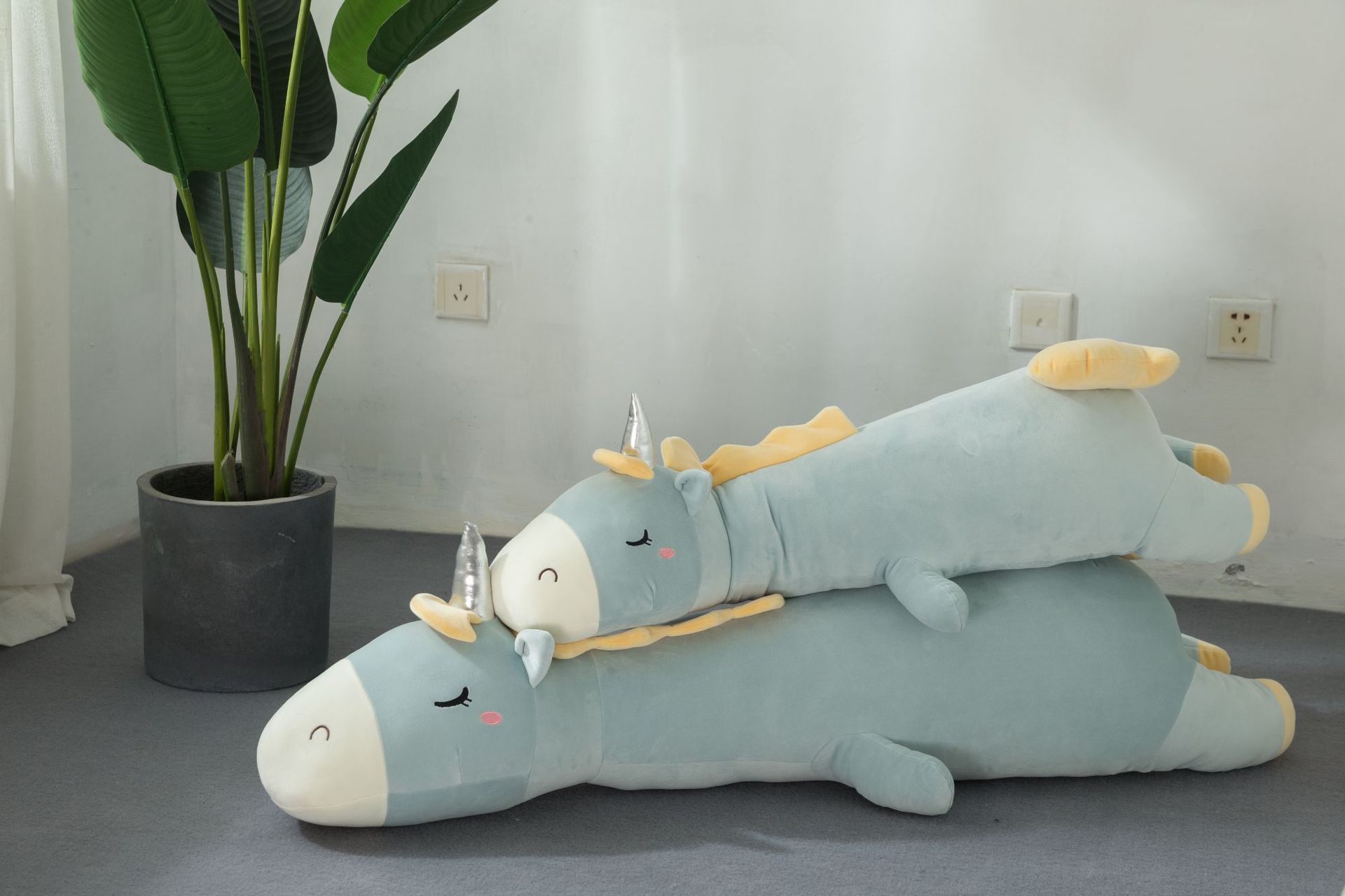 Gấu bông kì lân ôm ngủ cho bé chất vải mềm mịn an toàn không gây kích ứng 2 màu xanh hồng kích thước 70-90-120cm