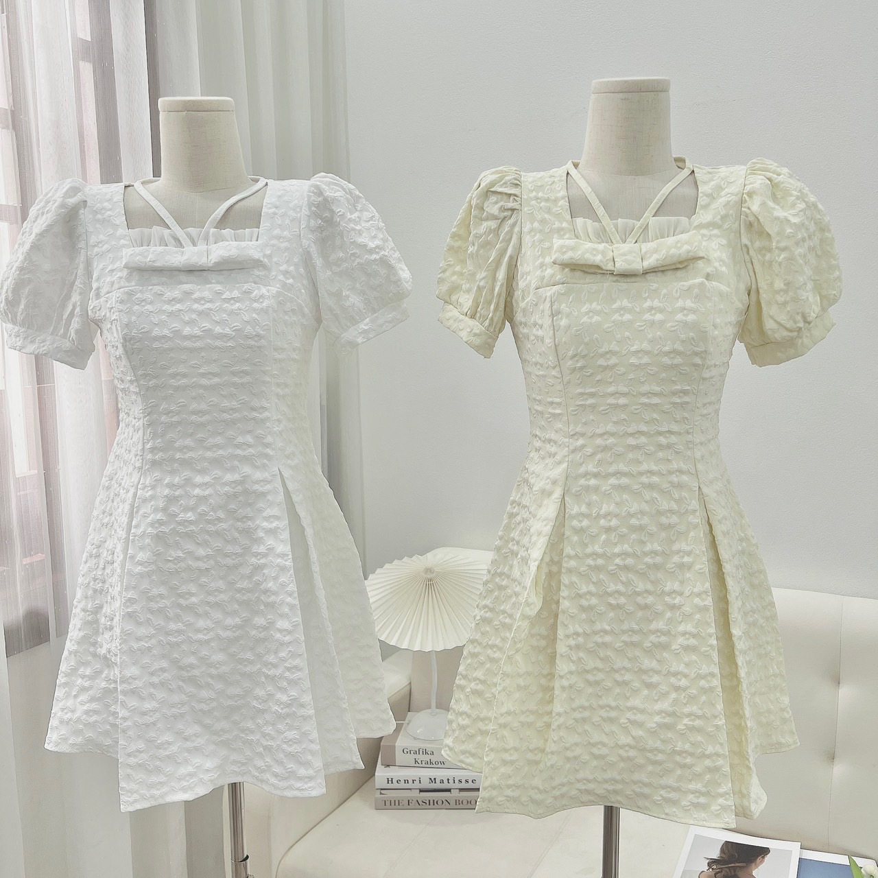 Đầm gấm nơ ngực đan dây chéo