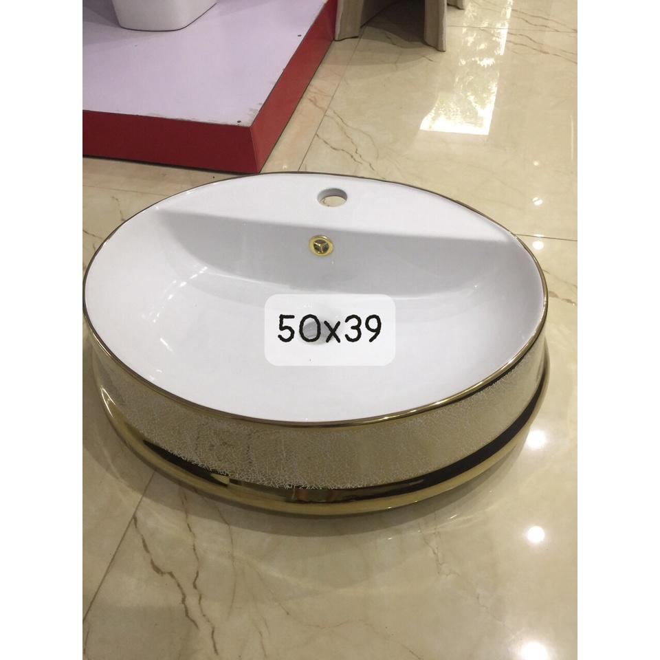 Chậu lavabo tròn đặt bàn, vòi cắm trên chậu