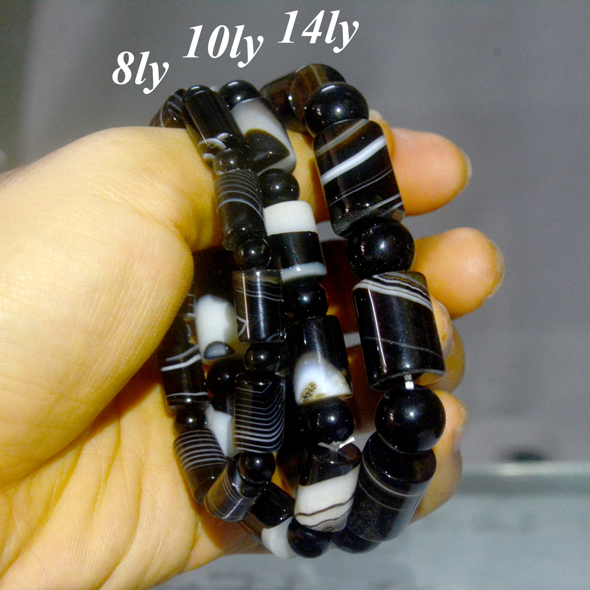 Vòng tay lắc mã não trụ bông đen trắng-Nhiều cỡ