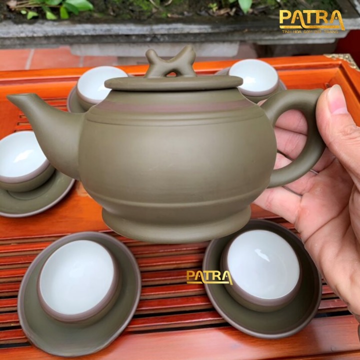 Bộ ấm chén uống trà cao cấp , bộ ấm trà Bát Tràng - trường sa trống đai xanh