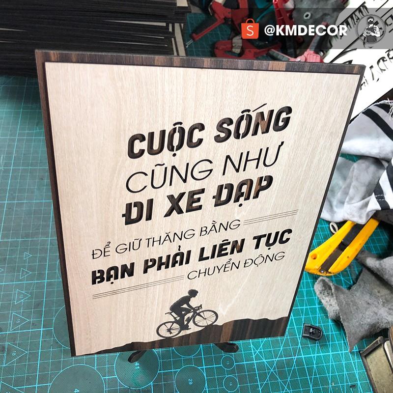 Tran gỗ - Tạo động lực mẫu câu &quot;cuộc sống cũng như đi xe đạp để giữ thăng bằng bạn phải liên tục chuyển động