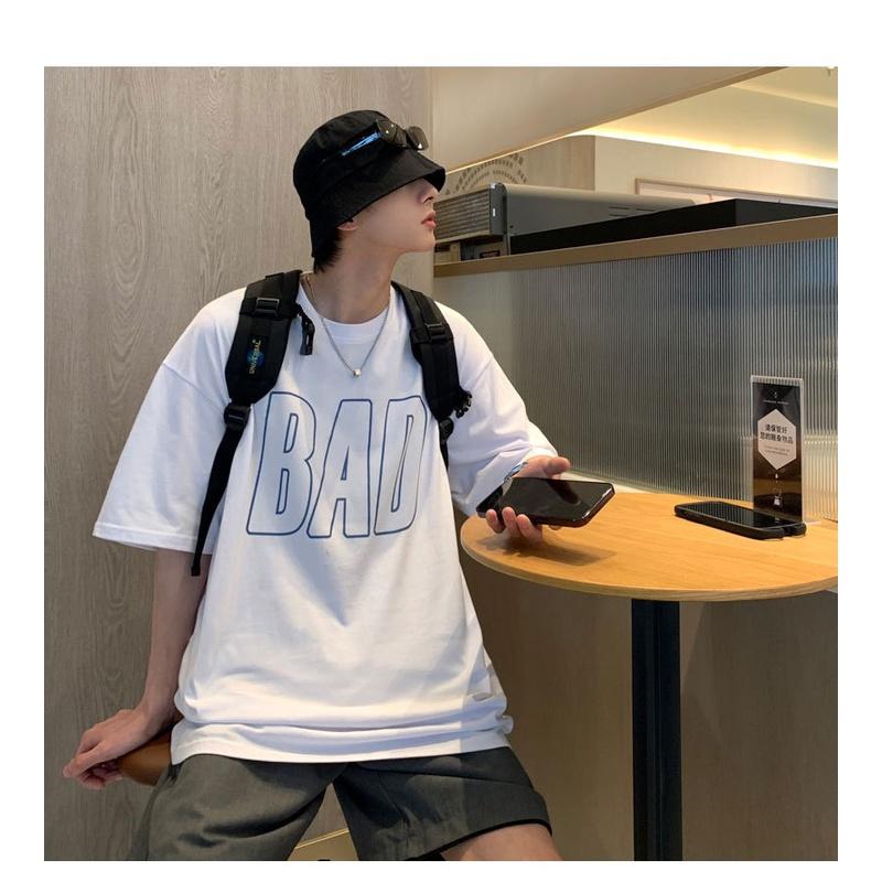 Áo thun tay lỡ BAD trước ngực dáng rộng unisex
