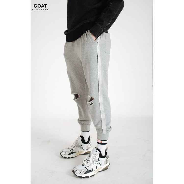 Quần Jogger Nam Vải Thun Rách Gối Uniex GOAT