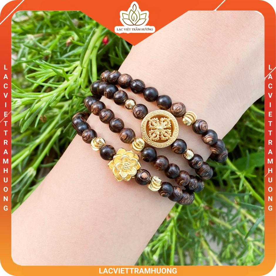 Vòng Tay Trầm Hương 108 Hạt Sánh Chìm Mix Charm Hoa Sen Vàng Phú Quý và Bánh Xe Pháp Luân Vàng - Lạc Việt Trầm Hương