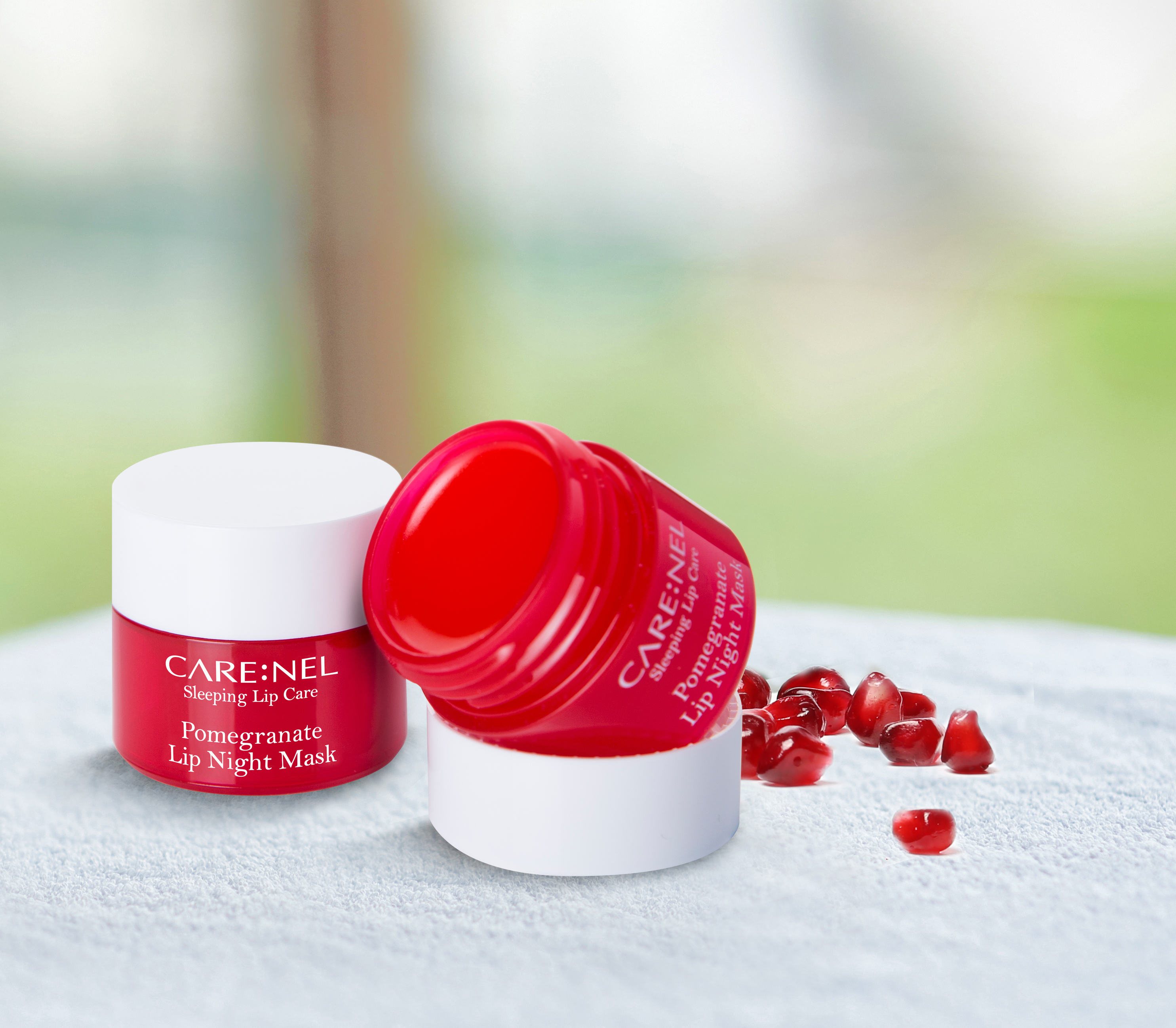 Mặt nạ ngủ môi lựu mềm môi ngừa lão hóa tẩy tế bào chết môi Carenel Pomegranate Lip Night Mask