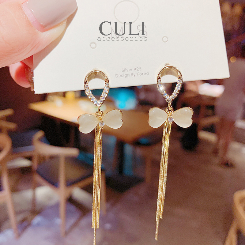 Khuyên tai dáng dài tua rua, hình nơ kết xà cừ HT609 - Culi accessories