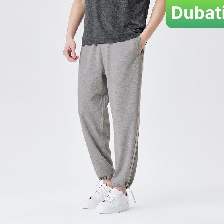 QUẦN JOGER THỂ THAO NAM NỮ 2 LINE - 2 SỌC UNISEX CHẤT NỈ DA CÁ ỐNG SUÔNG RỘNG EO CHUN RÚT DÂY SANG CHẢNH - DUBATIFASHION