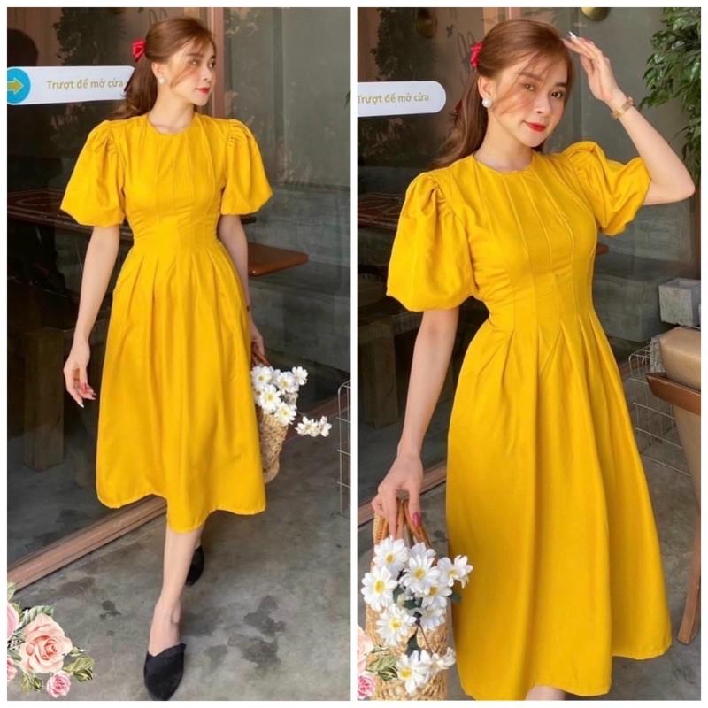 Đầm vàng cổ tròn xếp li