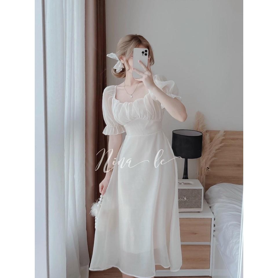 Đầm trắng xoè tiểu thư cổ vuông tay phồng xếp ly ngực