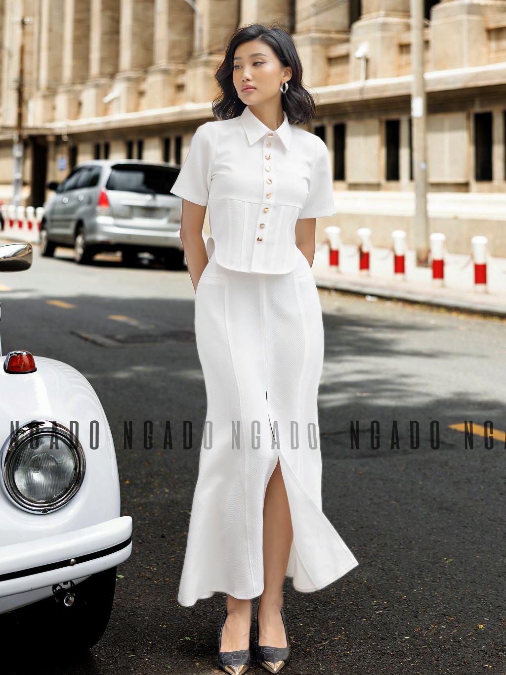 Set áo váy trắng ngắn tay NGADO , set đồ nữ , Set áo croptop vạt bầu kèm chân váy đuôi cá xẻ tà
