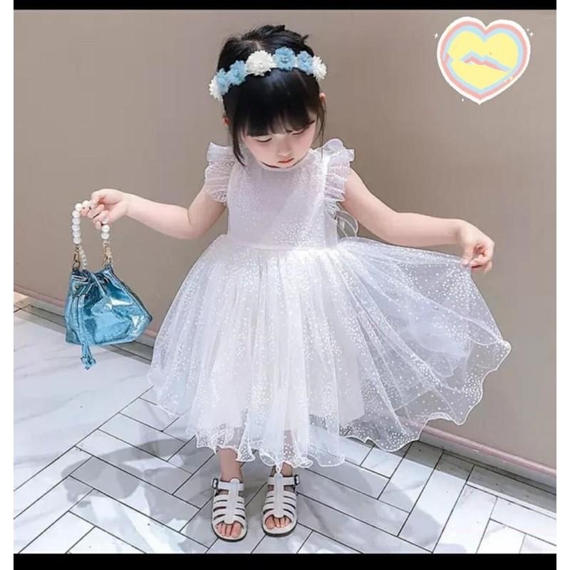 Váy ren trắng cánh công chúa bé gái