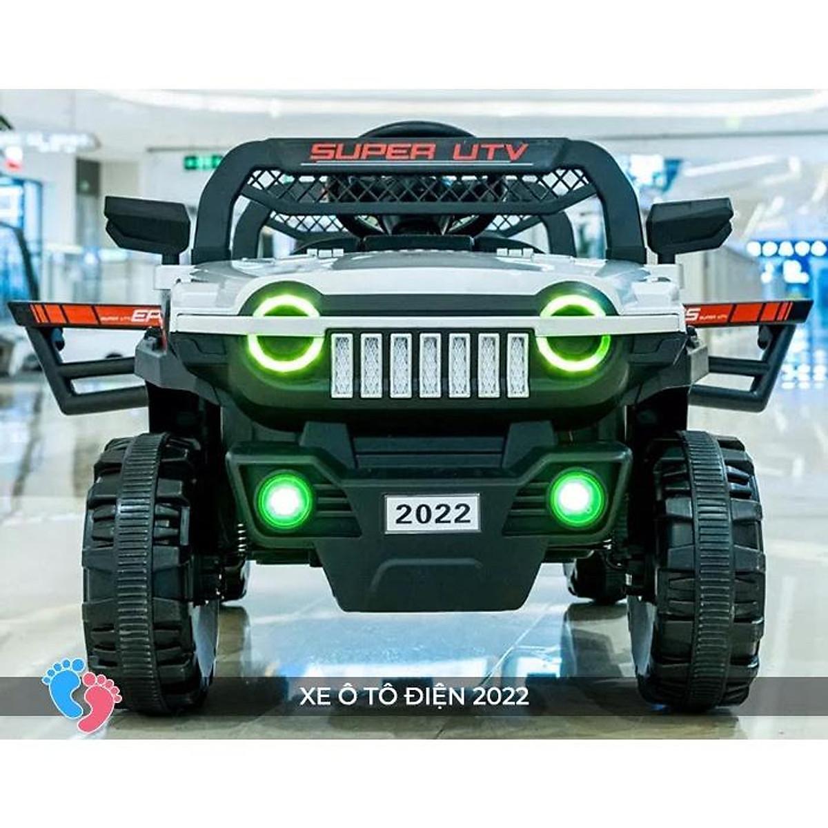Oto điện trẻ em địa hình gầm cao mới nhất 2022 có điều khiển từ xa