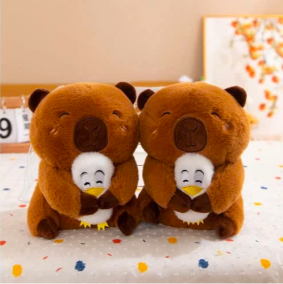 Thú nhồi bông capybara ôm vịt trắng đáng yêu - Size 22cm - Quà tặng gấu bông chuột lang capybara êm mịn cho bé.