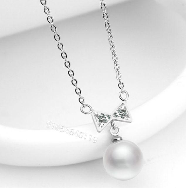 Dây chuyền nữ inox kiểu nơ kết hợp ngọc trai