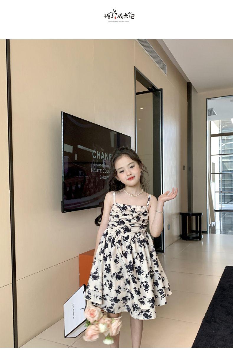SHUANGYAN Yuanbaoth trẻ em ăn mặc thời trang phù hợp với phong cách phương Tây mùa xuân ăn mặc trẻ em gái mảnh hoa sling váy dệt kim áo choàng