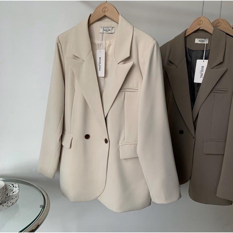 Áo blazer vạt xéo có túi