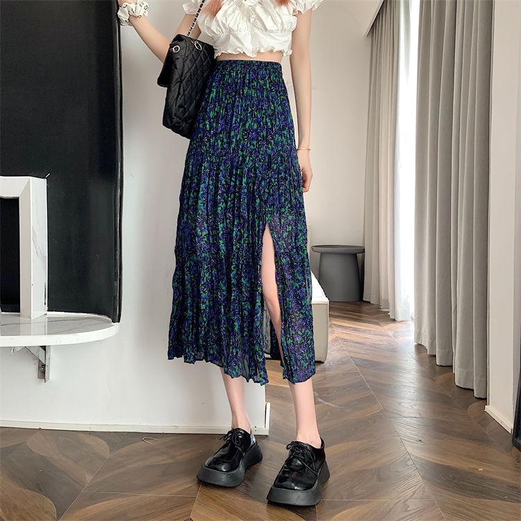 DONGSHOP Cao cấp hoa xẻ tà nửa người váy mùa xuân và mùa hè 2023 Vintage thả cảm thấy gầy váy xếp li một chữ dài váy